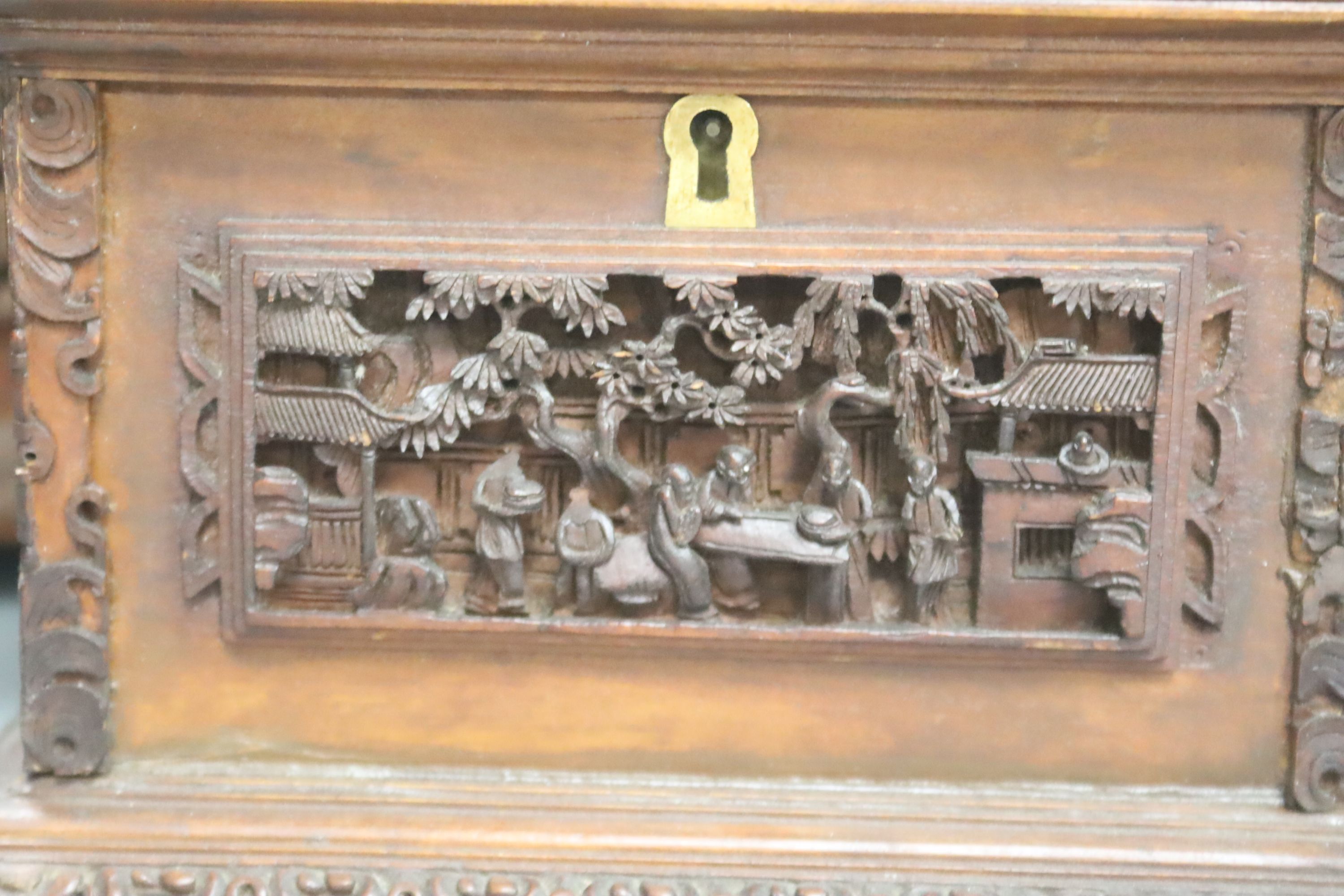 Three Chinese carved hardwood caskets, largest 19 x 15cm 13cm high